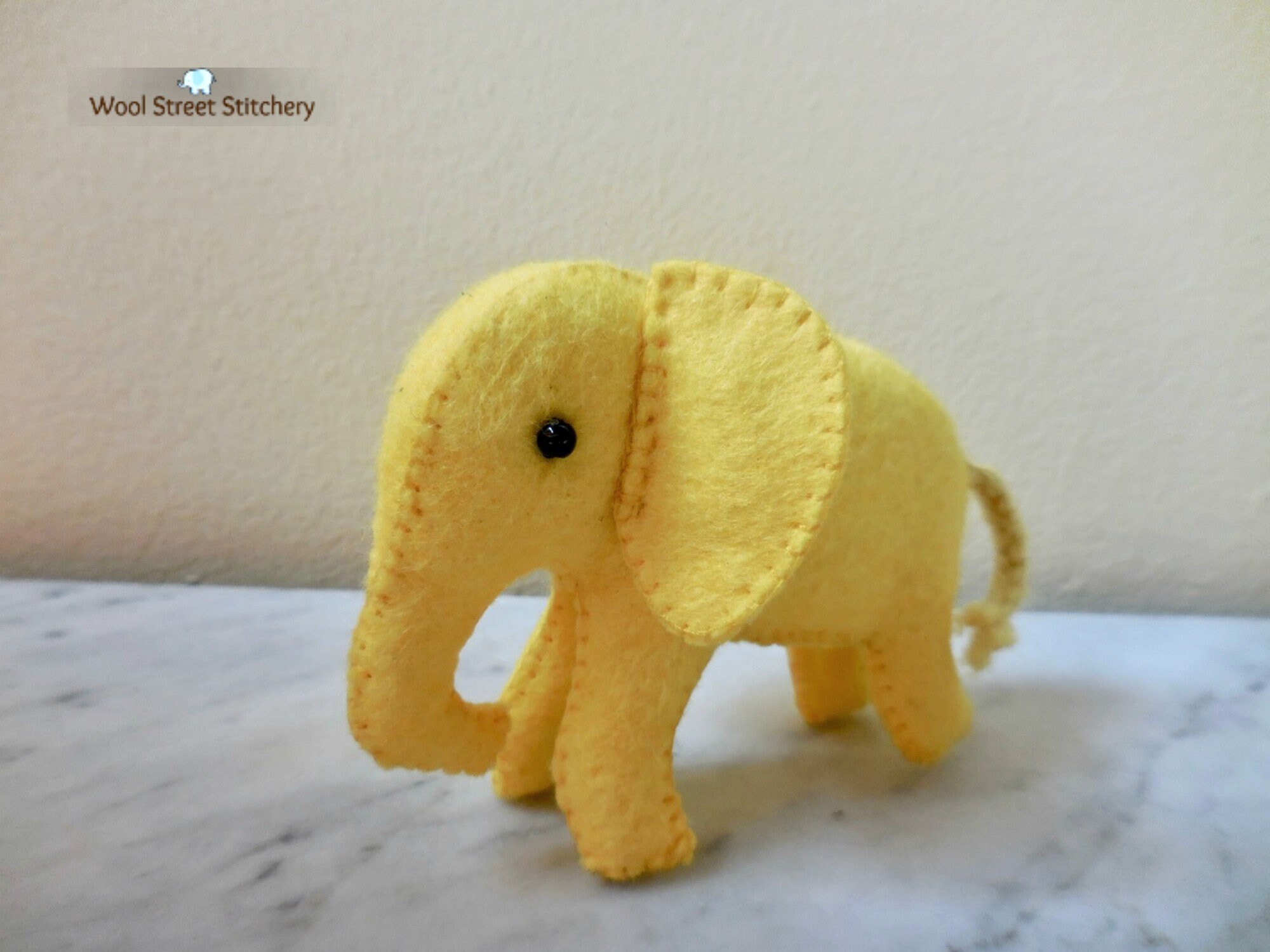 yellow stuffed elephant