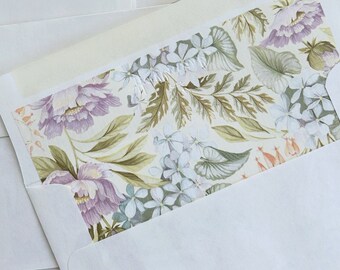 set of 13 vintage floral patterned envelopes