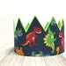 dinosaur with a crown on its head