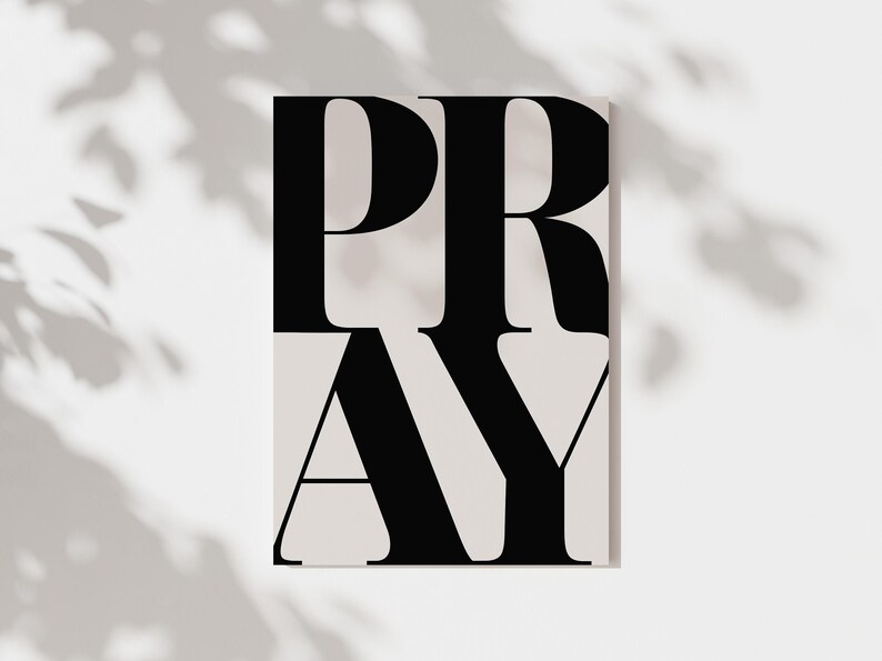 Close up of black and white PRAY scripture typography print digital download