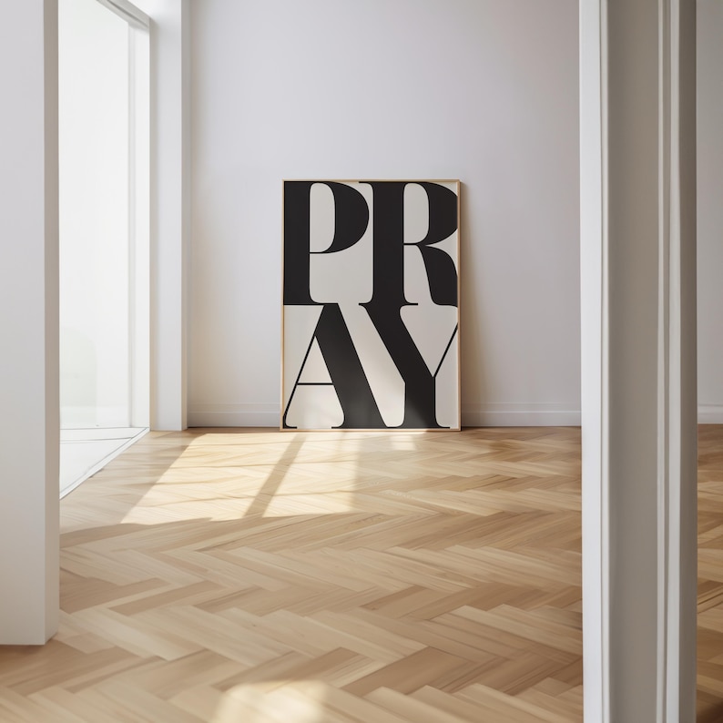 PRAY typography wall art print styled in a light, bright gallery wall