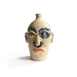 Face Jug with Black Eye and Mustache.