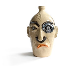 Face Jug with Black Eye and Mustache.