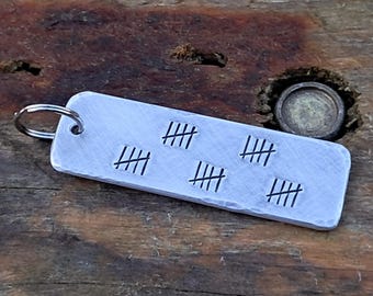 Sleutelhanger 25-jarig jubileum, 25 markeringen, cadeau zilveren huwelijksverjaardag