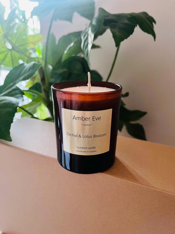 Orchid & Lotus Blossom Candle in Amber Glass