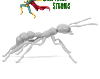 May include: A gray plastic model of an ant in a running pose. The ant has a long body with segmented legs and antennae.