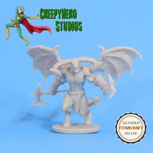 May include: A light gray miniature demon figure with large horns, wings, and a muscular physique, holding two axes. The figure is on a circular base. The image includes the text "CREEPYHERO STUDIOS" and a cartoon character.