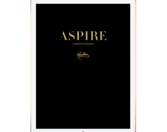 May include: A white tablet computer with a black screen displaying the text "ASPIRE CAREER DESIGNER" in gold lettering. A gold signature is below the text.
