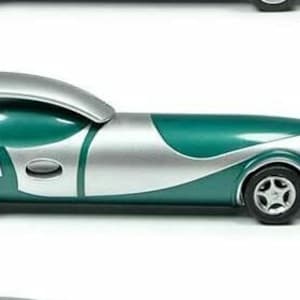 May include: A teal and silver toy car with a streamlined design. The car has a rounded front end and a long, narrow body.