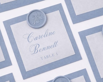 Custom place cards or escort cards for wedding in elegant pastels and monochromatic designs