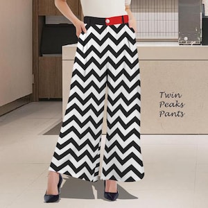 May include: Wide-leg pants with a black and white chevron pattern. The pants have a black waistband with a red accent and pockets. The text "Twin Peaks Pants" is visible on the right side of the image.