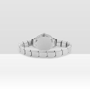May include: A silver wristwatch with a rectangular link strap. The watch face is round and the back of the watch is visible. The watch is displayed on a white surface.