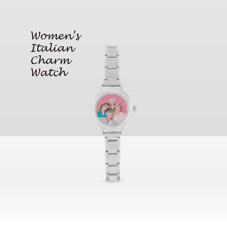 May include: A silver Italian charm watch with a round face displaying a family photo. The watch has a link band and a pink background on the watch face. The text "Women's Italian Charm Watch" is in the upper left corner.