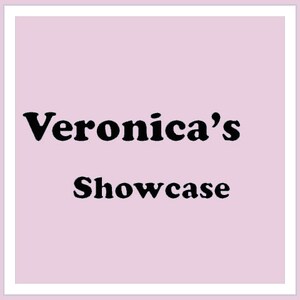 May include: A light pink square with a white border. The text "Veronica's Showcase" is displayed in black, bold font, centered on the pink background.