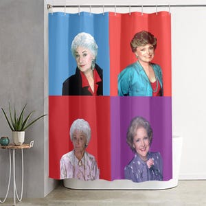 May include: A shower curtain featuring four panels with portraits of the Golden Girls. Each panel has a different background color: blue, red, red, and purple. The women are in various outfits and poses.