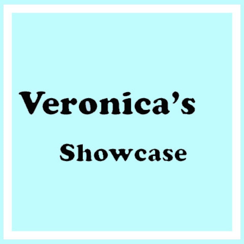 May include: A light blue square with a white border features the text "Veronica's Showcase" in bold black font. The text is centered on the light blue background.