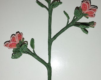 Branche de 3 roses orange "abricot" perlée pour centre de table ou dans un vase