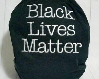 Black Lives Matter tygblöja - Broderad tygblöja - Babytygblöja - BLM tygblöja - Broderade mamelukar - Blöjskydd