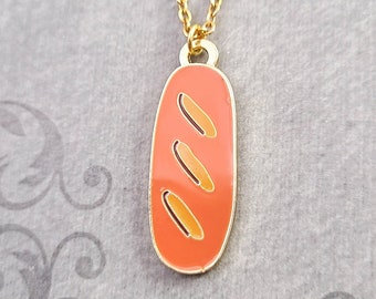 Pendant made of natural amber A piece of bread with a crust.
