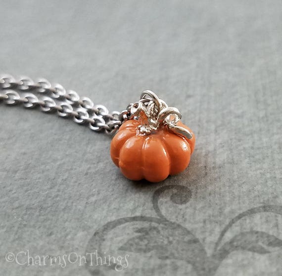 18 Halloween Accessories for a Little Everyday Spookiness 15 Tiny Pumpkin Charm