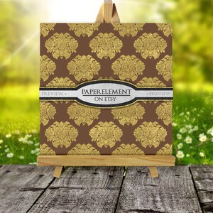 Puede incluir: Un papel digital con fondo marr&oacute;n y un patr&oacute;n floral dorado. El texto "PAPER ELEMENT ON ETSY" est&aacute; en una cinta negra y blanca.
