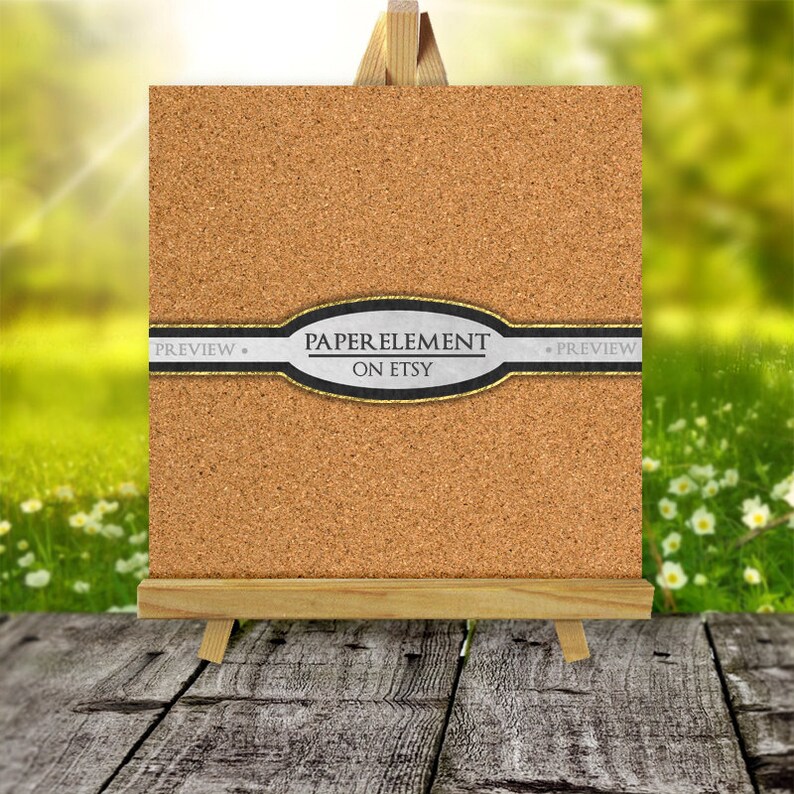 May include: A corkboard with a gold and black ribbon with the text "PAPER ELEMENT ON ETSY" on it. The corkboard is on a wooden easel.