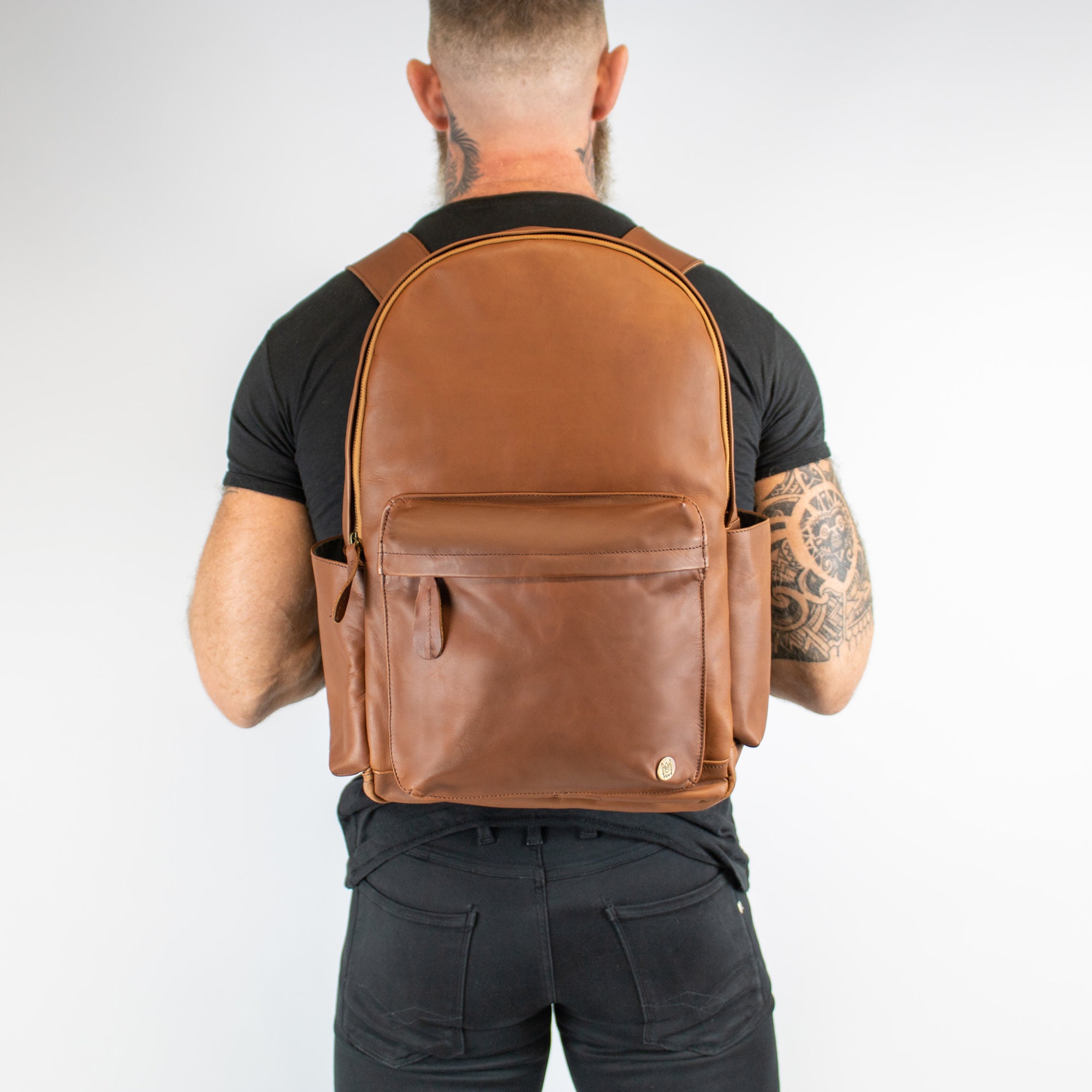 leather backpack with luggage strap
