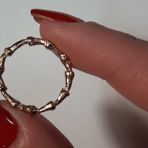 ring with small nails made of 18 carat gold