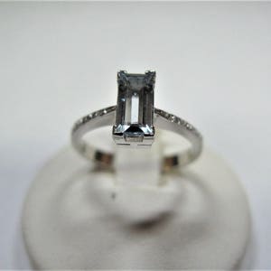 solitaire baguette ring of aquamarine and diamonds handmade in 18 carat white gold