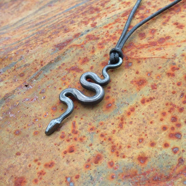 Snake pendant, hand forged from mild steel.