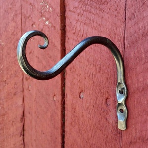 Small hand forged plant hook. Hand forged from mild steel.