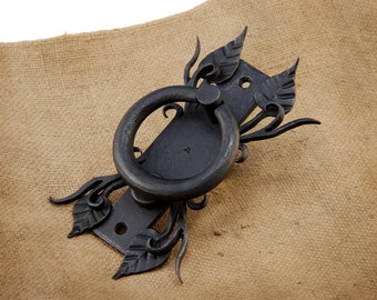 Steel door knocker, hand forged from mild steel, unique ornamental design.