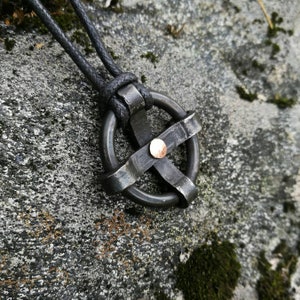 Sun cross pendant, hand forged from mild steel and copper.