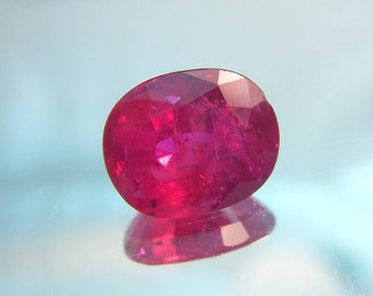 Nice large oval natural Thai ruby for a magnificent ring, with G.I.A. report.  From an estate piece, 3.67 ct.