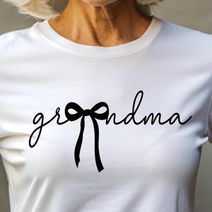 May include: A set of three ceramic nesting bowls in shades of blue, green, and white. The bowls feature a speckled glaze and a simple, modern design. The largest bowl is approximately 6 inches in diameter.