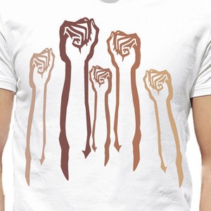 May include: Five raised fists in various shades of brown, symbolizing unity and strength.