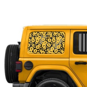 May include: Yellow Jeep Wrangler with a custom window decal featuring a repeating pattern of yellow and black circles.