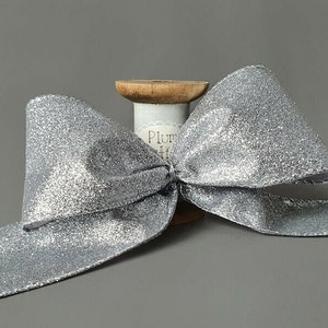 Silver Glitter Ribbon with Wired Edge, 63mm (2.5in) wide *Sold Per Metre*