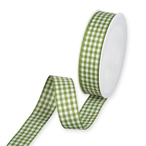 May include: Green and white gingham ribbon on a white spool. The ribbon is a classic checkered pattern.