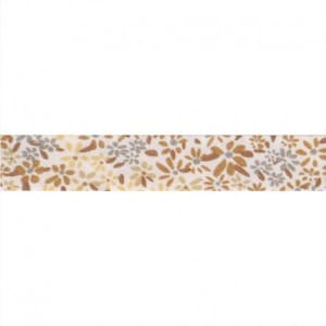 May include: A close-up of a white washi tape with a floral pattern in shades of brown and grey.