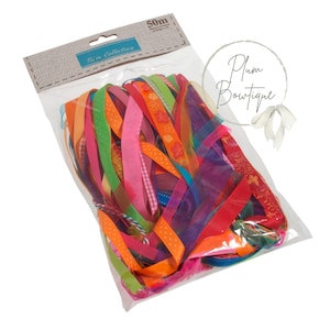 May include: A clear plastic bag filled with a variety of colourful ribbons. The bag is labelled "Trim Collection" and "50m".