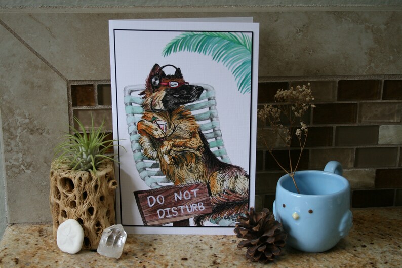 May include: A watercolor illustration of a dog wearing headphones and sunglasses, relaxing in a lounge chair with a drink. The dog is brown and black with a white chest. The background is a white card with the text "Do Not Disturb" on a wooden sign.