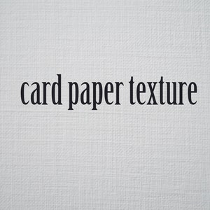 May include: Close-up of a white card paper texture. The text "card paper texture" is printed in black.