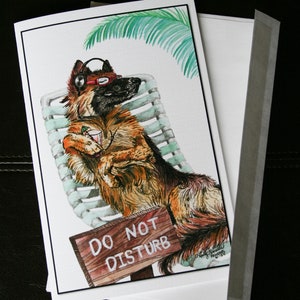 May include: A watercolor illustration of a German Shepherd dog wearing headphones and sunglasses, relaxing on a lounge chair with a drink. The dog is surrounded by palm leaves and a sign that reads "Do Not Disturb".