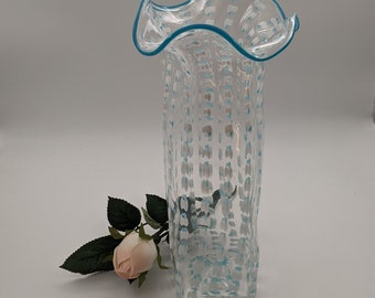 11" tall, signed, studio art glass vase, squared, with blue and white zipper decor against clear background. Applied rim. Signed.