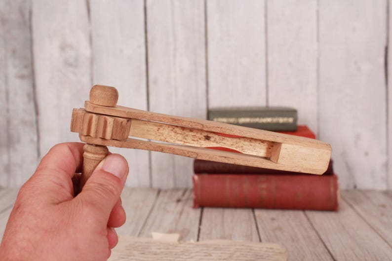 Noise Maker Wooden Football Rattle Image 0