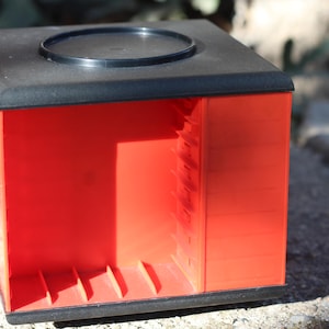 Vintage Red Plastic Cassette Tape Holder: Revolving Storage Cabinet