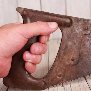 Vintage Hand Saw: Rusty Metal Handle, Collectible Tool (21-inch)