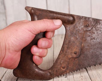 Vintage Hand Saw: Rusty Metal Handle, Collectible Tool (21-inch)
