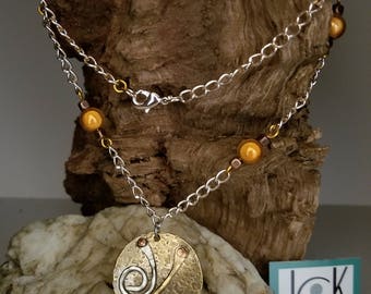 Copper and nickel medallion necklace